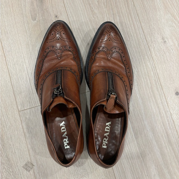 Prada Runway Lug-Sole Zip Wing-Tip, Brown.
Size Used like new
13 - Picture 2 of 5